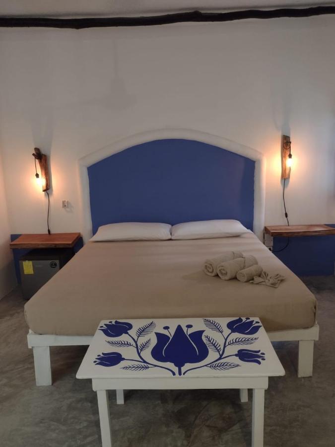 Mio Tulum Hotel Boutique Exterior foto A bedroom in a hotel