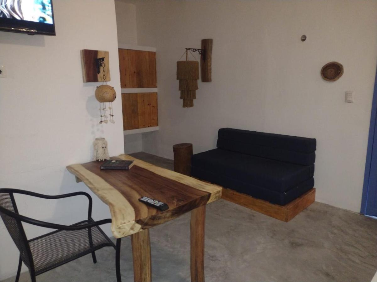 Mio Tulum Hotel Boutique Exterior foto A living room in a hotel in Greece