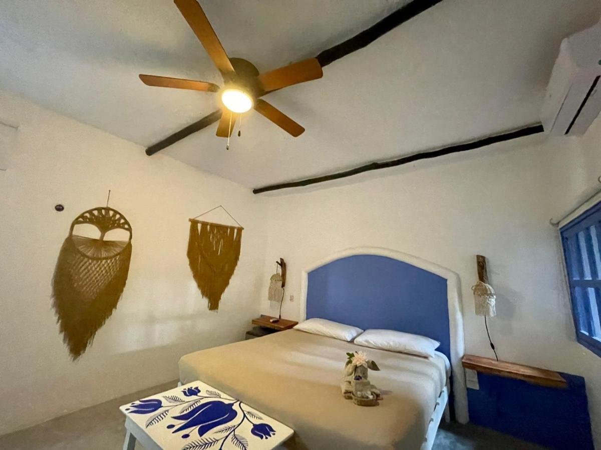 Mio Tulum Hotel Boutique Exterior foto A bedroom at the hotel